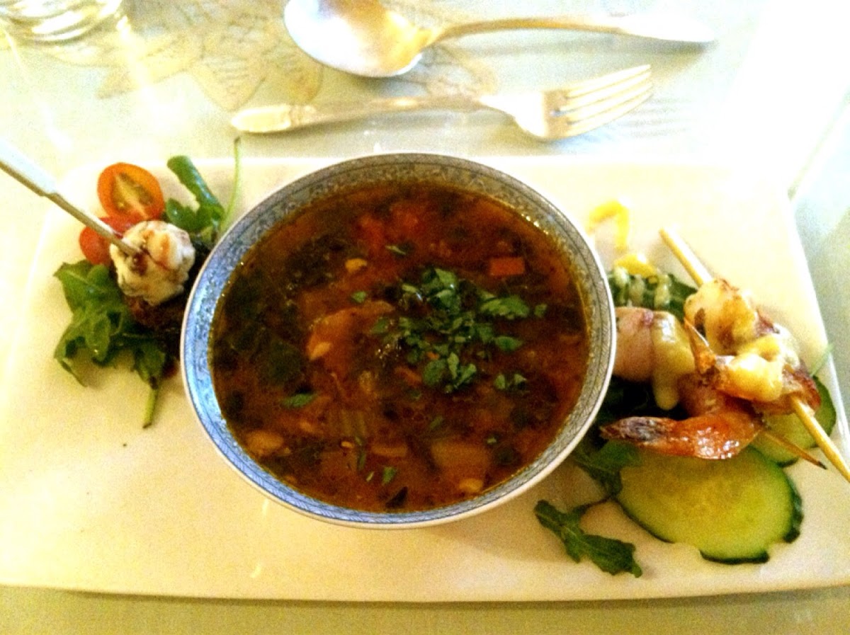 The espresso tenderloin, leek and vegetable soup, speck-wrapped shrimp.