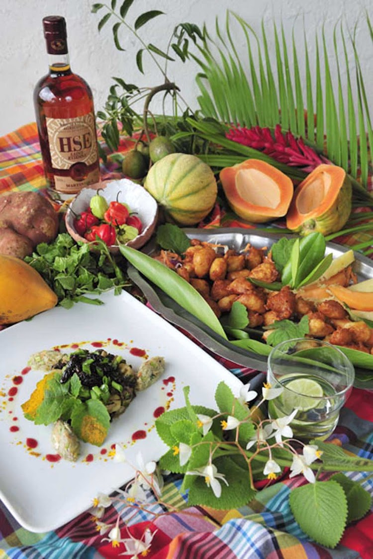 A spread with local cuisine at an even showcasing art, cuisine and culture in Martinique.