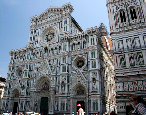 The ornate facade of the iconic Duomo in Florence, Italy. 