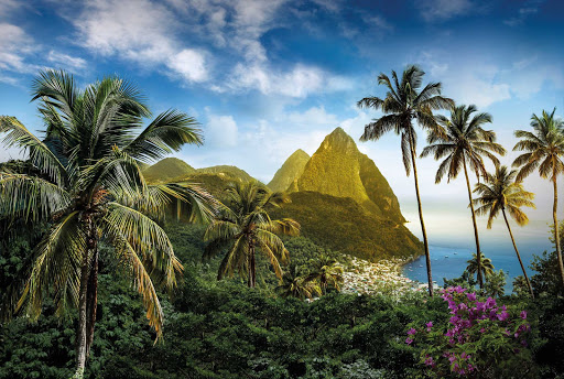 St-Lucia-evening-Pitons - The Pitons, two mountainous, lush volcanic spires, loom over Saint Lucia.