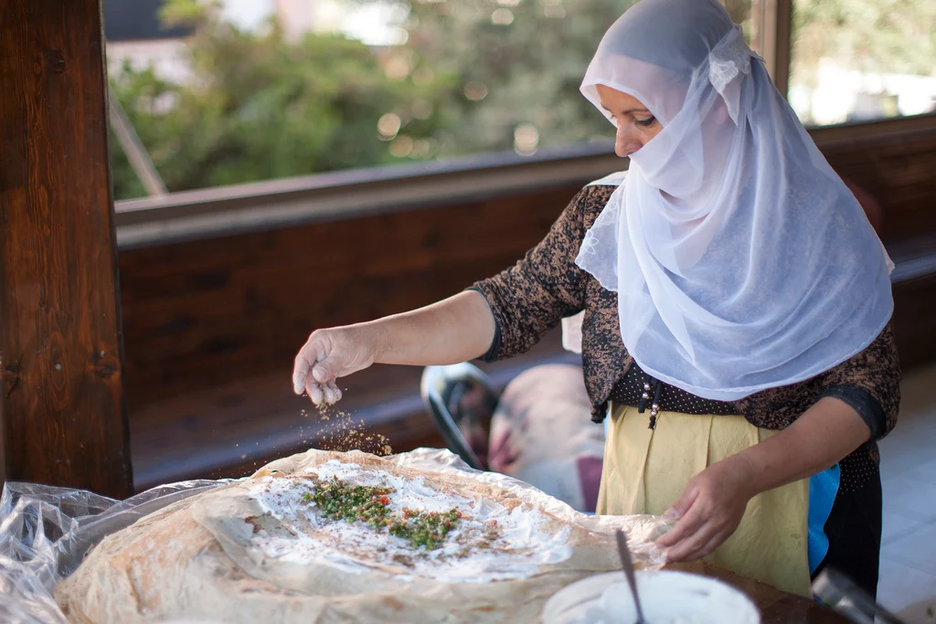 druze-woman-cheese-Israel - A Druze woman makes cheese in Northern Israel.