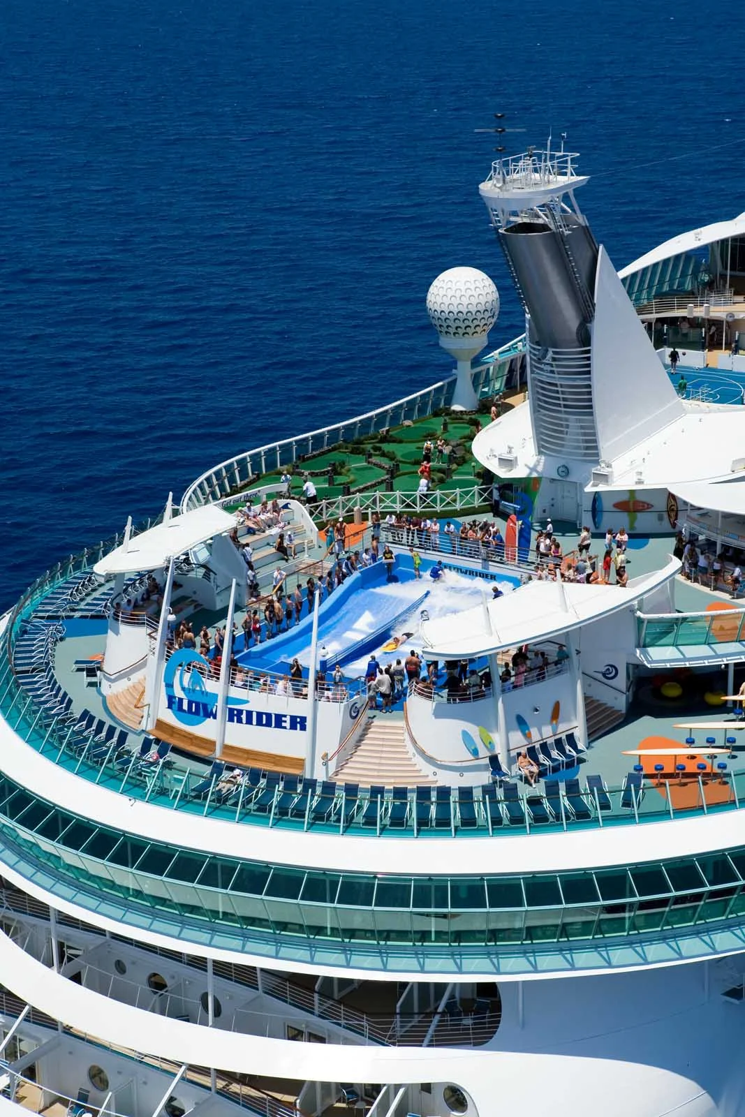 Liberty-of-the-Seas-aft-2 - Liberty of the Seas features 10 pools and whirlpools, the popular FlowRider, more than100 spa treatments and multiple  entertainment options.