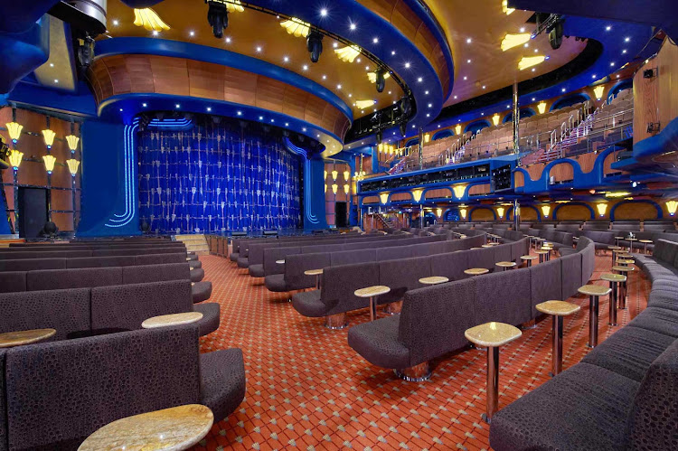 Put your hands together during performances in the Ovation Theater during your Carnival Breeze cruise.