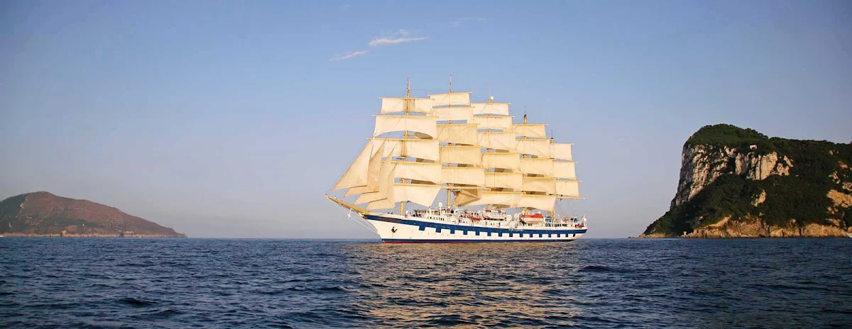 Royal-Clipper-in-Capri-Italy -   Royal Clipper, the world's only five-masted full-rigged sailing cruise ship, in Capri, Italy. 