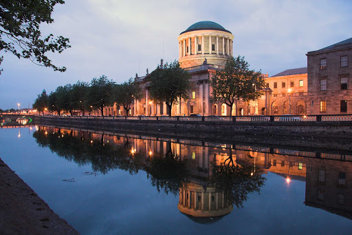The Four Courts on the River Liffey in Dublin. The Four Courts houses the Irish Supreme Court, High Court and the Central Criminal Court.