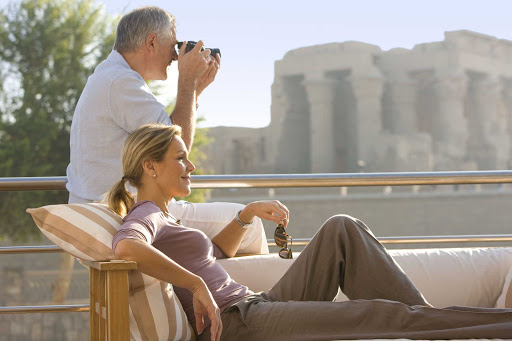 Uniworld-River-Tosca-sundeck-sightseeing - Take in the sights of historic monuments from the comfort of River Tosca's sundeck as you explore Egypt on a Uniworld cruise.