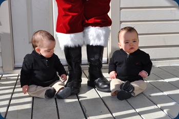Santa - boys sitting with boots