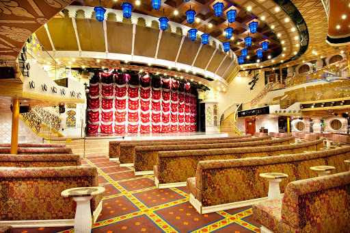 On your next Caribbean cruise, take in one of the Broadway-style shows at Carnival Pride's elegant Taj Mahal Lounge.