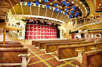 On your next Caribbean cruise, take in one of the Broadway-style shows at Carnival Pride's elegant Taj Mahal Lounge.