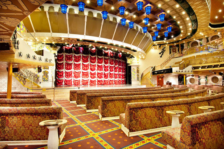 On your next Caribbean cruise, take in one of the Broadway-style shows at Carnival Pride's elegant Taj Mahal Lounge.