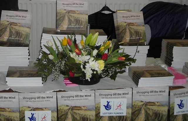 [Bookstall with flowers.jpg]