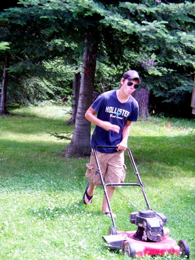 If ANYONE can be cool while mowing, 