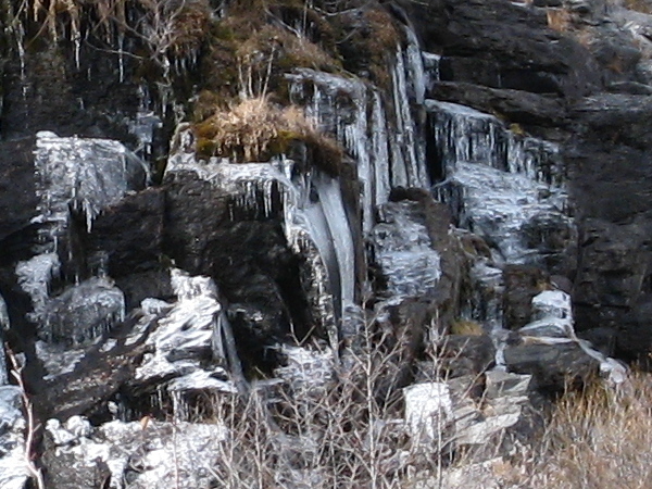 Hanging ice and a little flowing water.