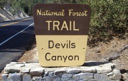 Road sign for trail to Devils Canyon.