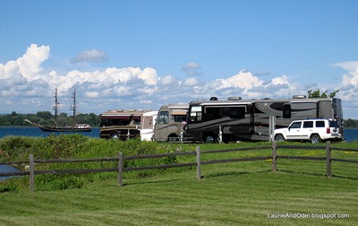 Elks RV parking with tall ship on the river.