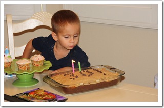 nate blowing out candles (1 of 1)