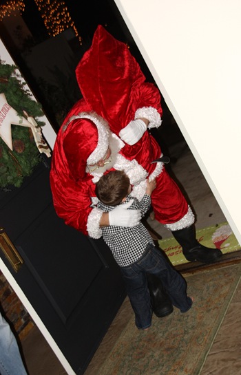 nate hugging santa at door (1 of 1)