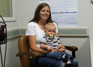 Ryan and Mom at Urgent Care - tooth through lip (1 of 1)