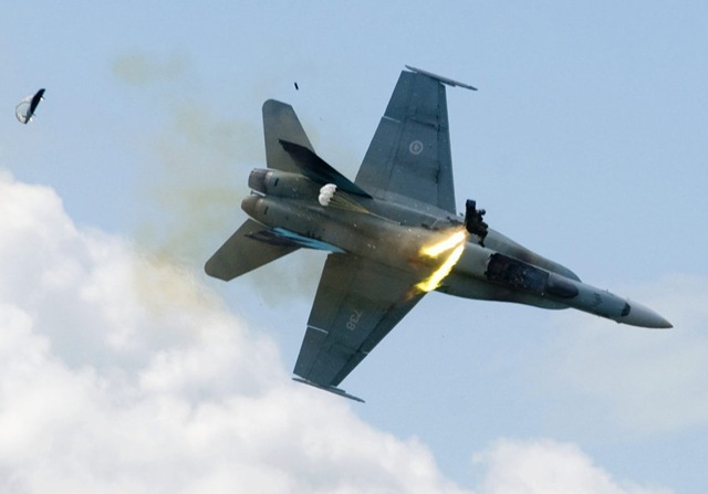 [Pilot ejects an instant before fighterjet crashes 1.jpg]