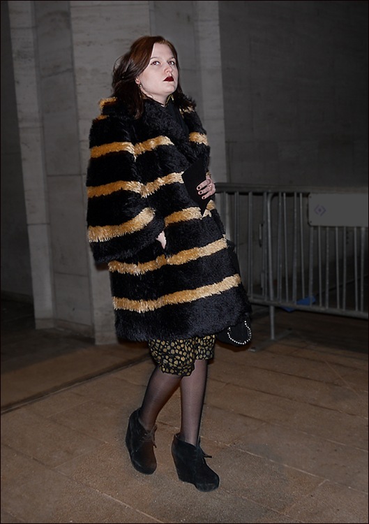 w black and gold striped fur