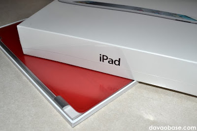 Our iPad 2 in the box, with Produce Red Smart Cover