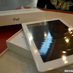 iPad 2 outside the box, with plastic covering