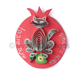 Quilled cat with apple