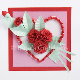Folded roses on a Valentine card