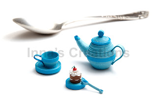 Quilled cup, cake and teapot