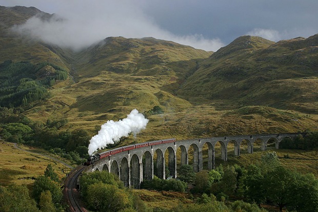 A lucky break in the clouds catches the K1 on Glenfinnan viaduct in the last week of the Jacobite Steam Train season at Fort William, UK