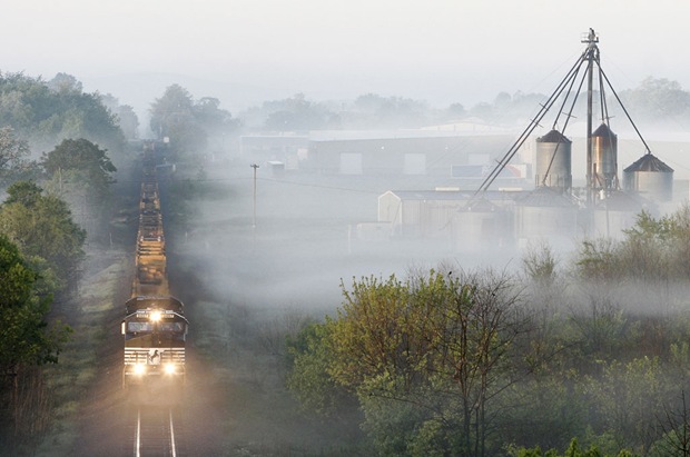 23R Train runs north in the mist in Ranson, West Virginia, USA 