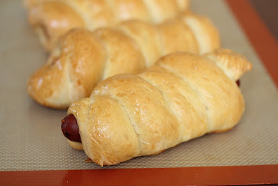 close-up photo of a sausage roll on a silpat