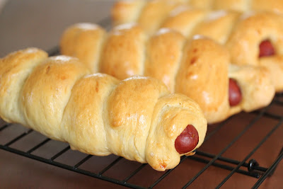 sausage rolls on a baking rack