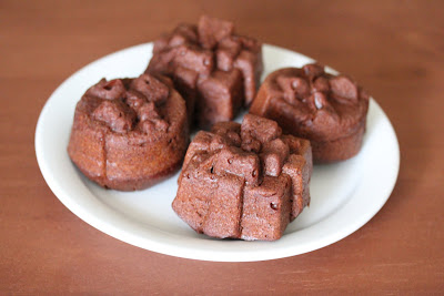 photo of four chocolate cakelets on a plate