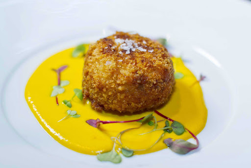 150-Central-Park-Royal-Caribbean-appetizer-3 - An appetizer with a rich, zesty sauce served at 150 Central Park aboard Oasis of the Seas, under the direction of James Beard Award-winning chef and Miami restaurateur Michael Schwartz.