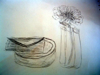 A drawing of a desk scene with a letter, small bowl, and a flower