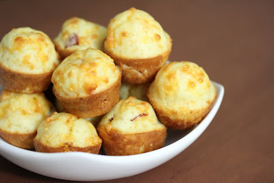 Pepperoni pizza puffs in a white bowl
