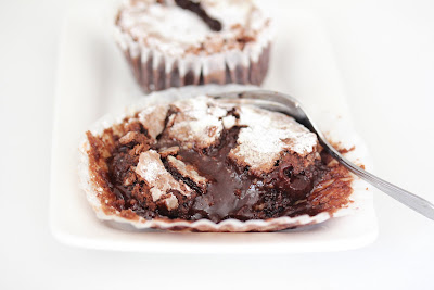 close-up photo of a cake with chocolate oozing out