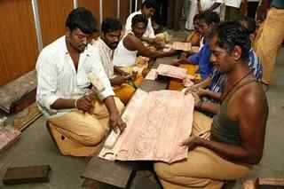 The copper frames which will later be gold-plated and put on the temple walls