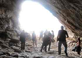 Ochre found in this cave at the tip of Pinnacle Point in South Africa has offered up key evidence that early humans were engaging in symbolic behavior long before anthropologists previously surmised. (Photo courtesy of Logan Bartram)