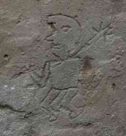 Photo courtesy Professor Edward Swenson. A picture of a Moche warrior, found in a building complex on top of the pyramid. He appears to be carrying a club. 