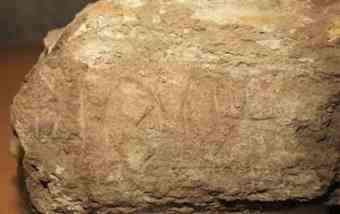 The four-sign inscription on sandstone, reportedly the first of its kind on sandstone found at Harappan sites