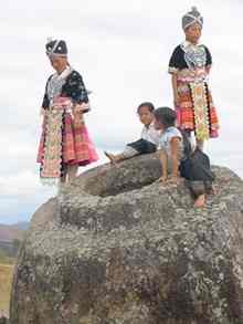 Locals standing on one of the Jars