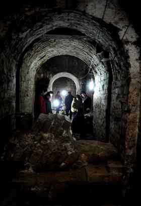 This photo taken on December 30, 2009 shows archaeologists unearthed the tomb of Cao Cao, a warlord during the Three Kingdoms period (208-280 A.D.), in Anyang of central China's Henan province.