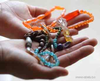 The accessories made in ancient China's Han Dynasty (206 BC-220 AD) and excavated at Caoxie Village in Lianzhou Town of Hepu County, southwest China's Guangxi Zhuang Autonomous Region.