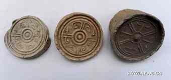 Eave tile made in ancient China's Han Dynasty (206 BC-220 AD) and unearthed at Caoxie Village in Lianzhou Town of Hepu County, southwest China's Guangxi Zhuang Autonomous Region