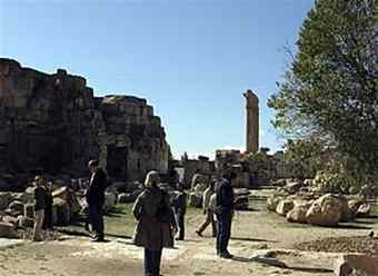 This Nov. 2009 photo shows a group of visitors as they tour the Roman ruins in Baalbek, Lebanon . The massive complex of ruins at Baalbek, near the Syrian border, is just 55 miles east of Beirut. 