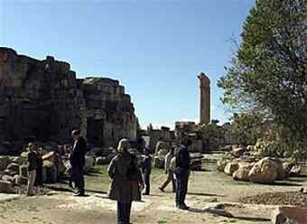 This Nov. 2009 photo shows a group of visitors as they tour the Roman ruins in Baalbek, Lebanon  . The massive complex of ruins at Baalbek, near the Syrian border, is just 55 miles east of Beirut. 