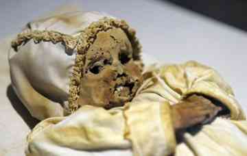 The mummified remains of Johannes Orlovitz, one of the Vac mummies, is displayed at the new Mummies of the World exhibit