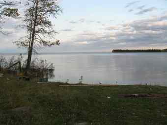 4,600 years ago a man was buried here, on the south shore of Big Trout Lake, in Northern Ontario. 